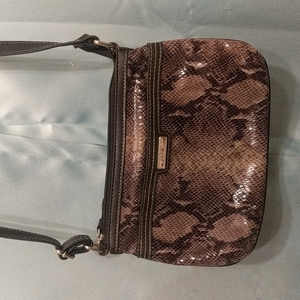 EUC relic by fossil snakeskin purse